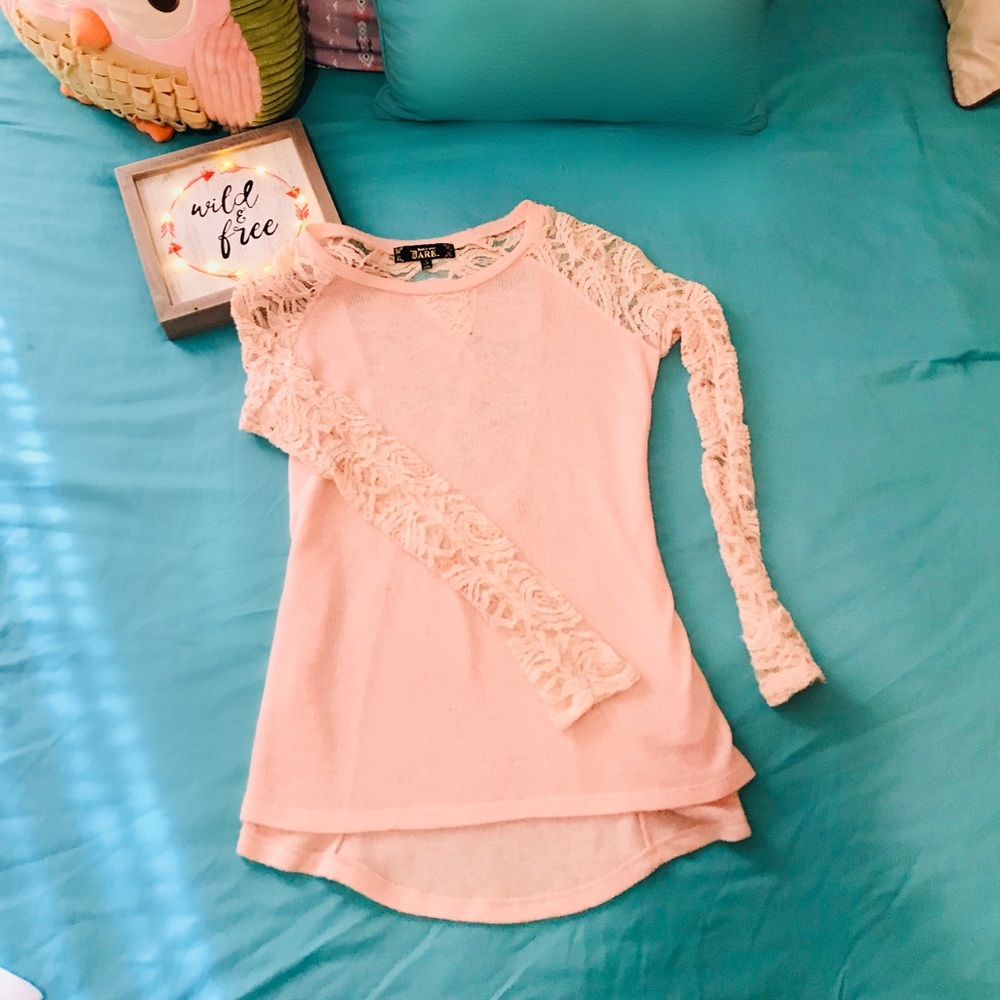 Light pink sweater with lace sleeves and back